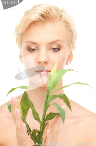 Image of woman with sprout