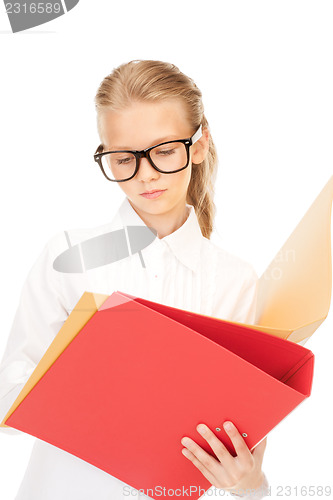 Image of elementary school student with folders 