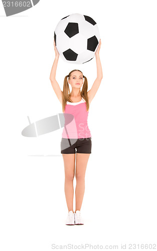 Image of lovely woman with big soccer ball