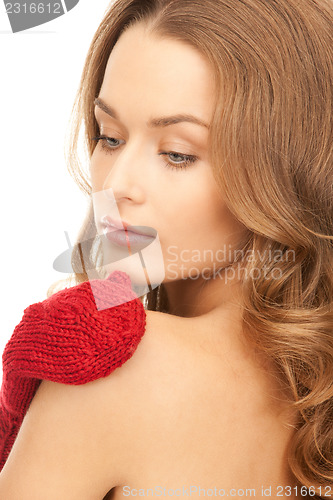 Image of beautiful woman in red mittens 