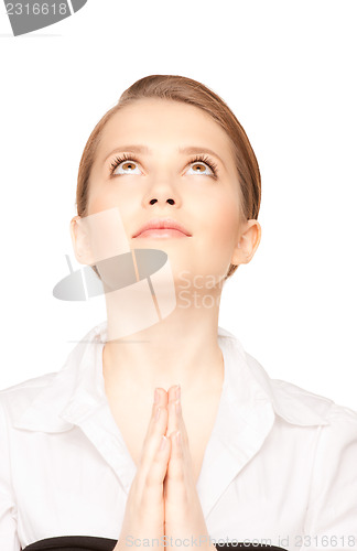 Image of praying teenage girl