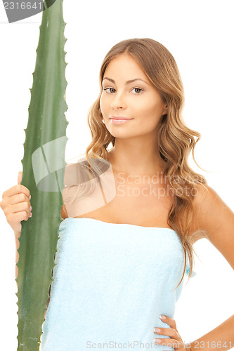 Image of lovely woman with aloe vera 