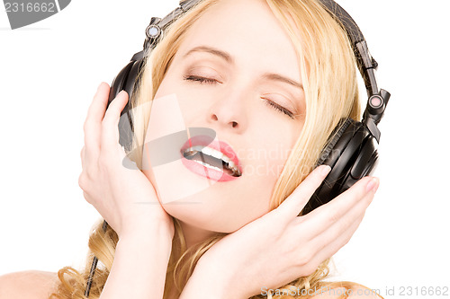 Image of happy woman in headphones