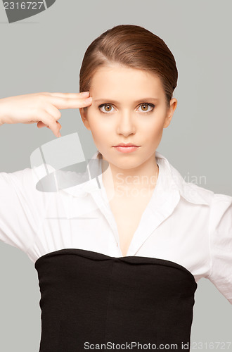 Image of woman showing suicide gesture 