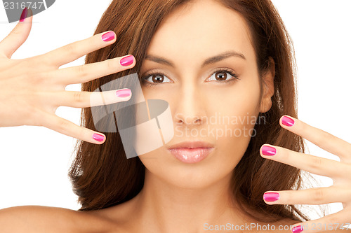 Image of lovely woman with polished nails