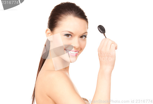 Image of happy woman with car key