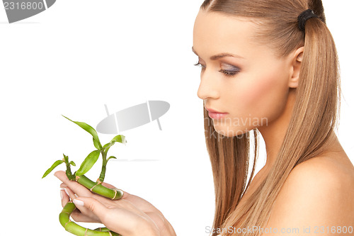 Image of woman with sprout