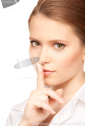 Image of finger on lips 