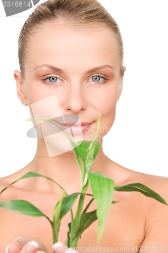 Image of woman with sprout