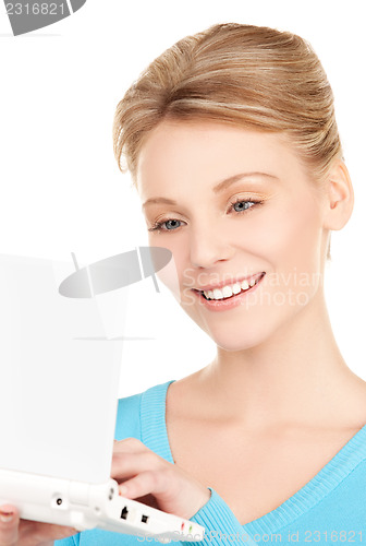 Image of happy woman with laptop computer