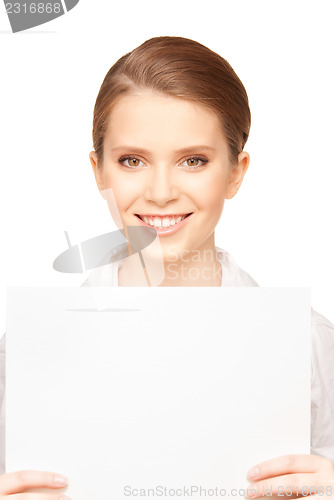 Image of happy teenage girl with blank board