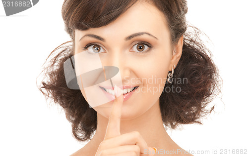 Image of finger on lips 