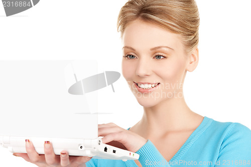 Image of happy woman with laptop computer