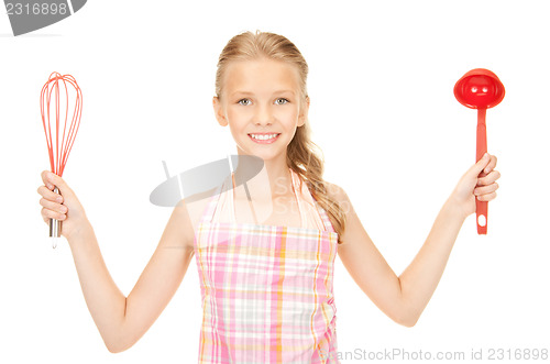 Image of little housewife with red ladle