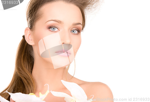 Image of beautiful woman with white flower