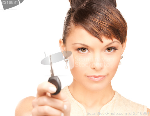 Image of happy woman with car key