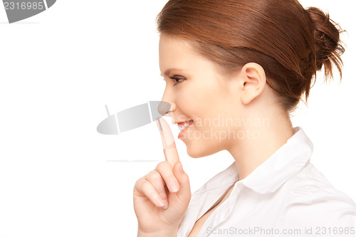 Image of finger on lips