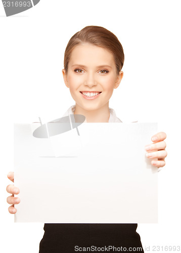Image of happy teenage girl with blank board