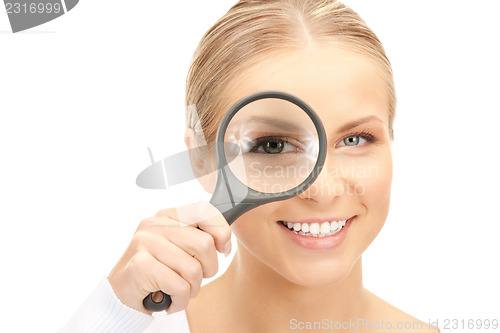 Image of woman with magnifying glass