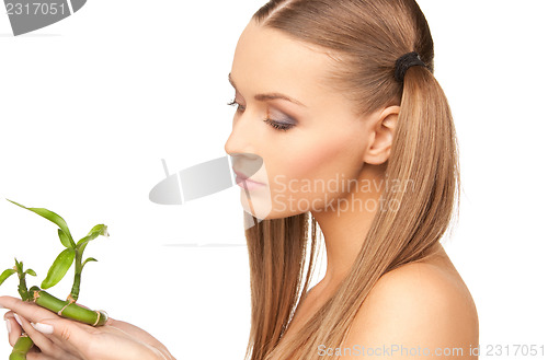 Image of woman with sprout