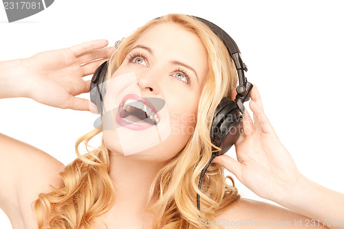 Image of happy woman in headphones