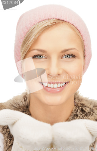 Image of beautiful woman in winter hat
