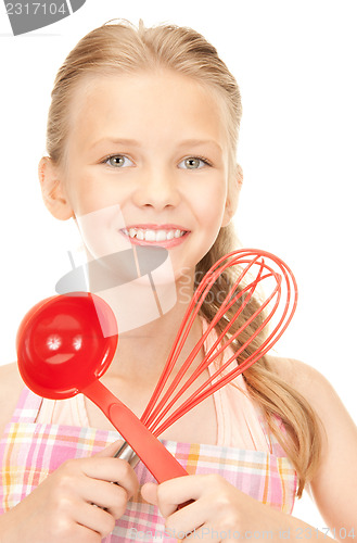 Image of little housewife with red ladle