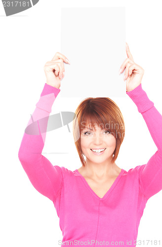 Image of happy woman with blank board 