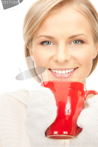 Image of beautiful woman with red mug
