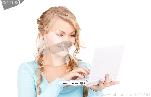 Image of happy woman with laptop computer