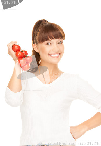 Image of woman with ripe tomatoes