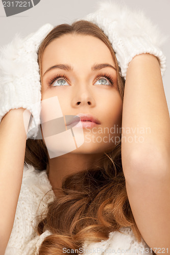 Image of beautiful woman in white gloves