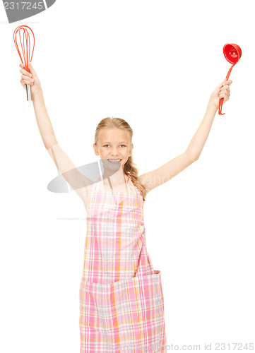 Image of little housewife with red ladle