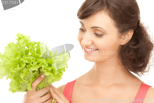 Image of woman with lettuce