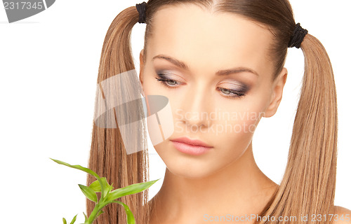 Image of woman with sprout