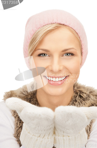 Image of beautiful woman in winter hat