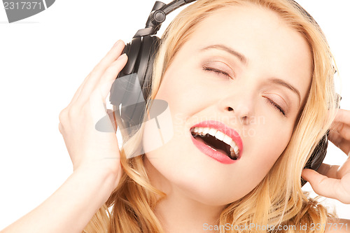 Image of happy woman in headphones