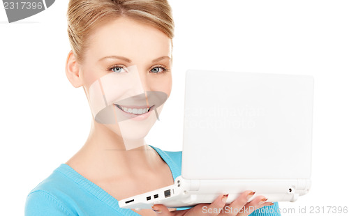 Image of happy woman with laptop computer