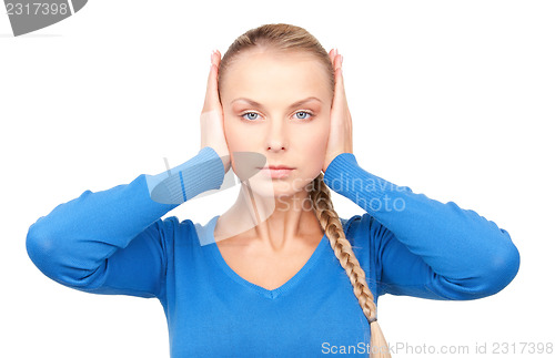 Image of woman with hands on ears