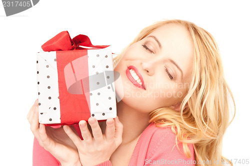Image of happy woman with gift box