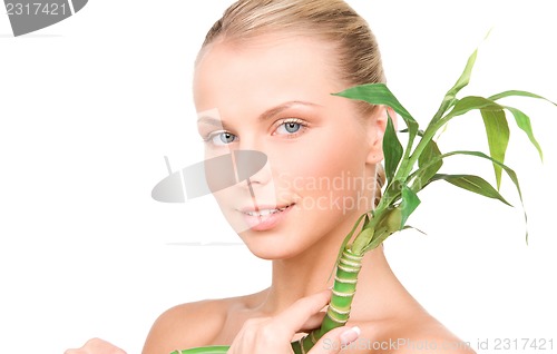Image of woman with sprout