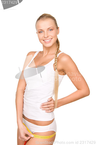 Image of beautiful woman with measure tape