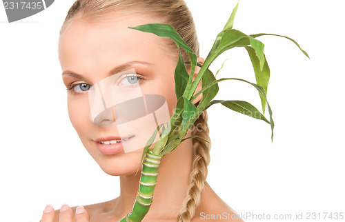 Image of woman with sprout