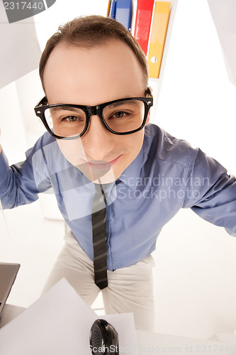 Image of funny picture of businessman in office