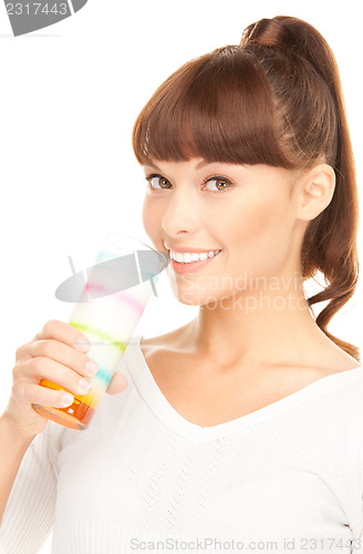 Image of lovely woman with glass of milk