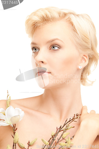 Image of lovely woman with twig