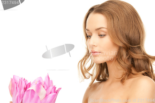 Image of beautiful woman with lotus flower 