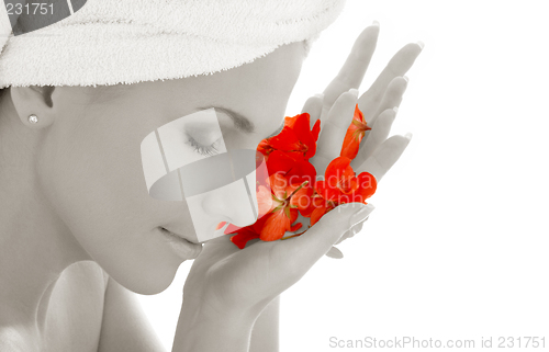 Image of monochrome lady and red petals