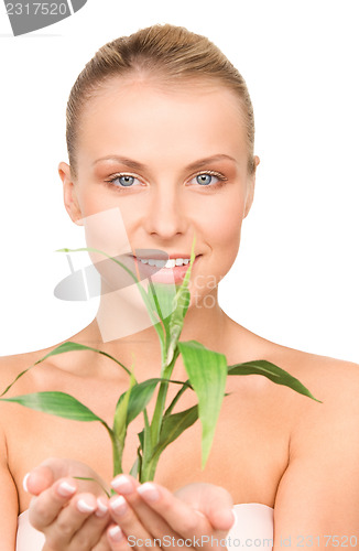 Image of woman with sprout