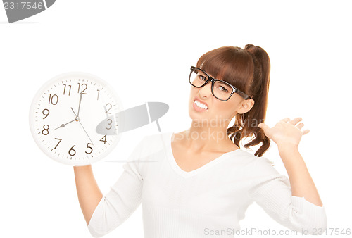 Image of woman holding big clock